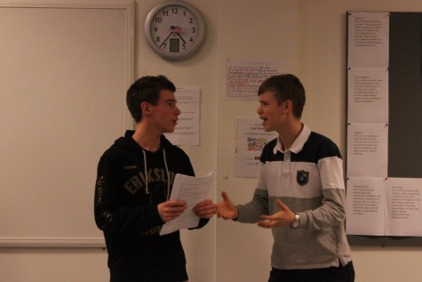 Two grade 10 students perform a play.