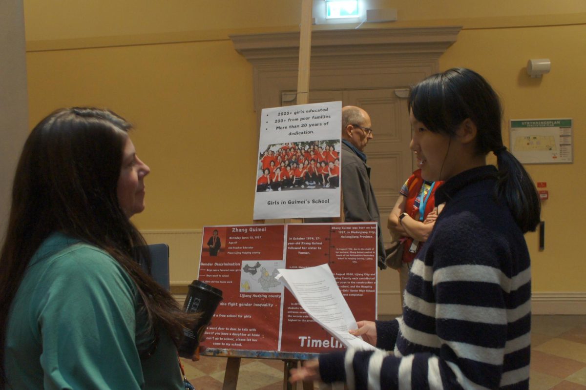 Amelie presents her project about Guimei to Ms Robinson. Guimei was a champion of girls' right to education.